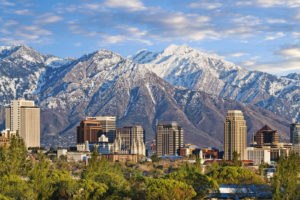 Skyline of downtown Salt Lake City with the Towering Wasatch Mountain range in the background